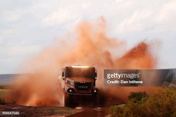 Federico Villagra of Argentina and YFP Infinia Diesel Team De Rooy drives with co-driver Adrian Arturo Yacopini of Argentina and mechanic Ricardo...