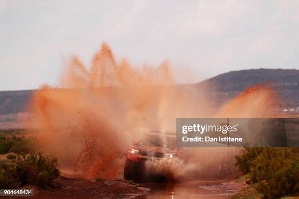 Nasser Al-Attiyah of Qatar and Toyota Gazoo Racing drives with co-driver Matthieu Baumel of France in the Hilux Toyota car in the Classe : T1.1 : 4x4...