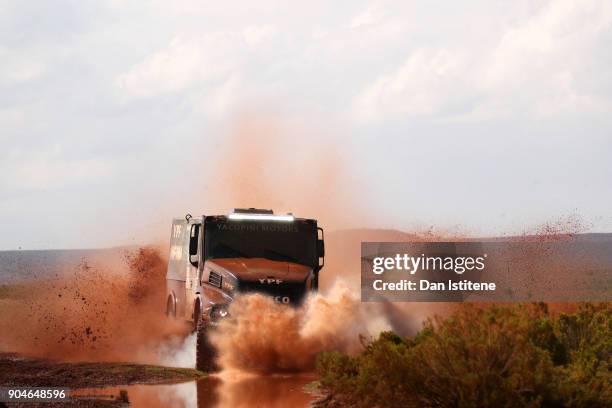 Federico Villagra of Argentina and YFP Infinia Diesel Team De Rooy drives with co-driver Adrian Arturo Yacopini of Argentina and mechanic Ricardo...