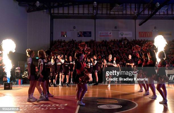 Suzy Batkovic of the Fire enters the court during game one of the WNBL Grand Final series between the Townsville Fire and Melbourne Boomers at...