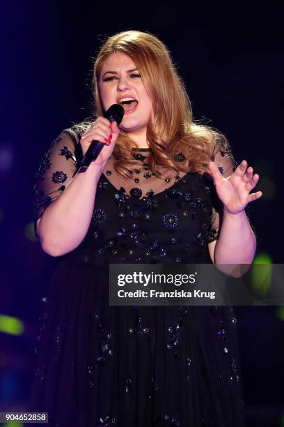 Singer Alina performs during the 'Schlagerchampions - Das grosse Fest der Besten' TV Show at Velodrom on January 13, 2018 in Berlin, Germany.