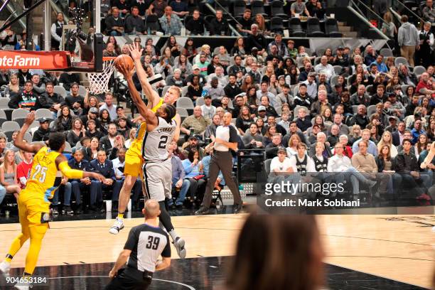Kawhi Leonard of the San Antonio Spurs shoots the ball against the Denver Nuggets on January 13, 2018 at the AT&T Center in San Antonio, Texas. NOTE...