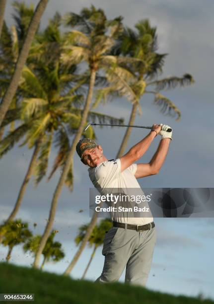 John Peterson plays a tee shot on the 17th hole during the third round of the Sony Open in Hawaii at Waialae Country Club on January 13, 2018 in...
