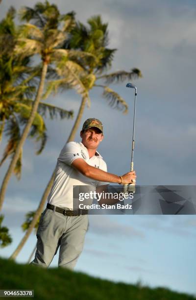 John Peterson plays a tee shot on the 17th hole during the third round of the Sony Open in Hawaii at Waialae Country Club on January 13, 2018 in...