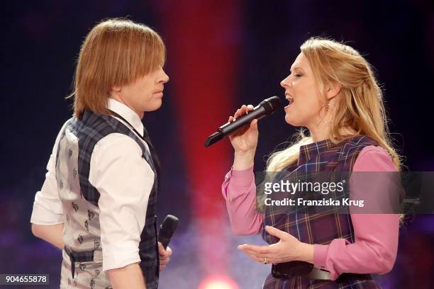 John Michael Kelly and Maria Patricia Kelly perform during the 'Schlagerchampions - Das grosse Fest der Besten' TV Show at Velodrom on January 13,...