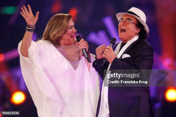 Al Bano & Romina Power perform during the 'Schlagerchampions - Das grosse Fest der Besten' TV Show at Velodrom on January 13, 2018 in Berlin, Germany.