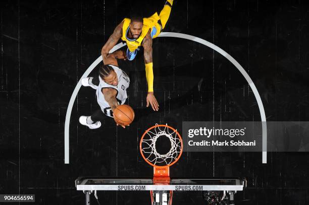 Kawhi Leonard of the San Antonio Spurs shoots the ball against the Denver Nuggets on January 13, 2018 at the AT&T Center in San Antonio, Texas. NOTE...