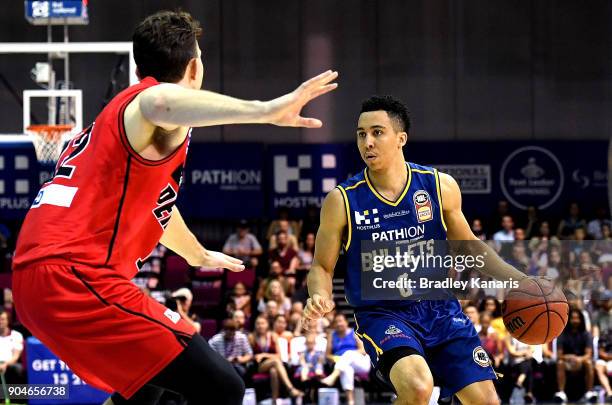 Travis Trice of the Bullets looks to take on the defence during the round 14 NBL match between the Brisbane Bullets and the Perth Glory at Brisbane...