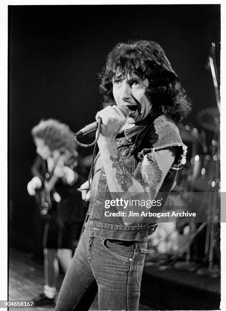 Singer Bon Scott and Angus Young of the Australian rock group AC/DC perform at The Agora Ballroom on May 24, 1979 in Atlanta, Georgia.