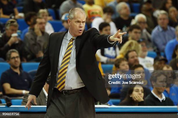 Head coach Tad Boyle of the Colorado Buffaloes sends a signal to his team in the first match of the Colorado v UCLA game at Pauley Pavilion on...