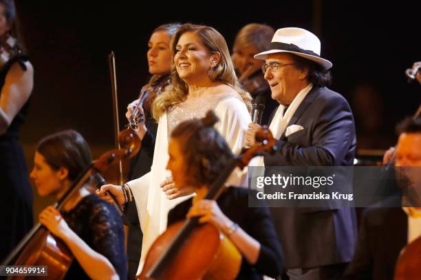 Al Bano & Romina Power perform during the 'Schlagerchampions - Das grosse Fest der Besten' TV Show at Velodrom on January 13, 2018 in Berlin, Germany.