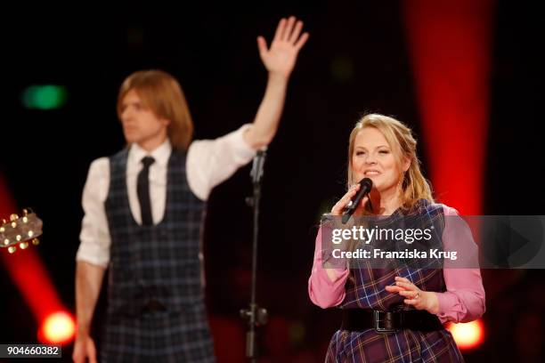 John Michael Kelly and Maria Patricia Kelly perform during the 'Schlagerchampions - Das grosse Fest der Besten' TV Show at Velodrom on January 13,...