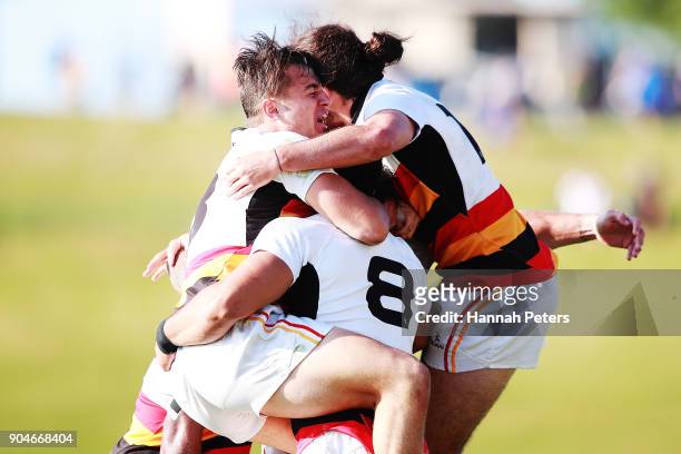 Tyler Campbell of Waikato celebrates with the team after winning the Bayleys National Sevens Men's Cup Final match between Waikato and Tasman at...