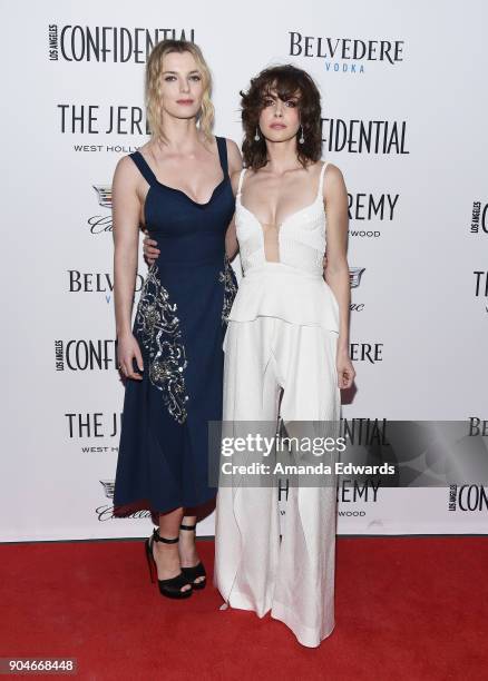 Actresses Betty Gilpin and Alison Brie arrive at the Los Angeles Confidential "Awards Issue" Celebration hosted by cover stars Alison Brie, Milo...