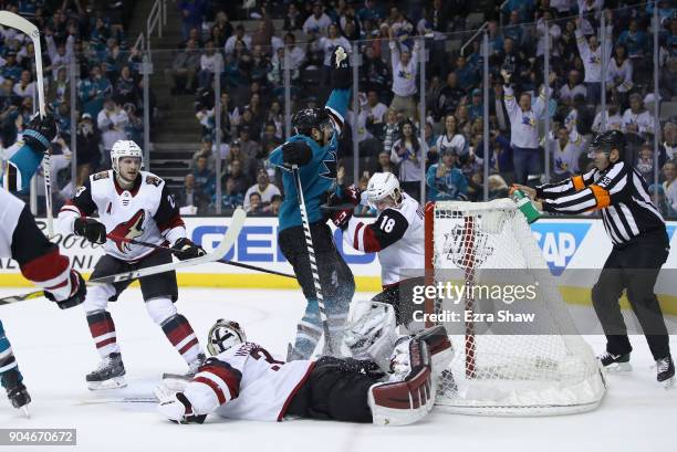Marc-Edouard Vlasic of the San Jose Sharks celebrates after scoring the winning goal in overtime against the Arizona Coyotes at SAP Center on January...