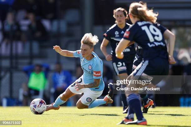 Jessica Fishlock of Melbourne City falls to the ground after colliding with Gulcan Koca of Melbourne Victory during the round 11 W-League match...