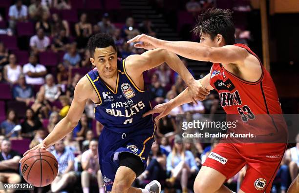 Travis Trice of the Bullets takes on the defence during the round 14 NBL match between the Brisbane Bullets and the Perth Wildcats at Brisbane...