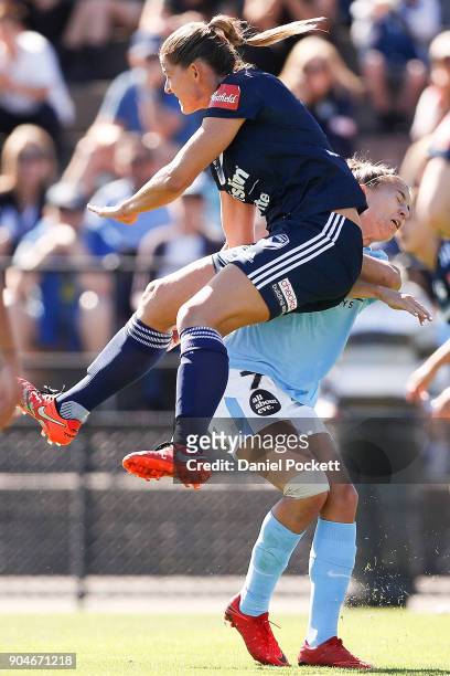 Laura Alleway of Melbourne Victory and Stephanie Catley of Melbourne City collide during the round 11 W-League match between the Melbourne Victory...