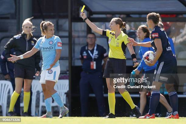 Tyla-Jay Vlajnic of Melbourne City is shown a yellow card during the round 11 W-League match between the Melbourne Victory and Melbourne City at...