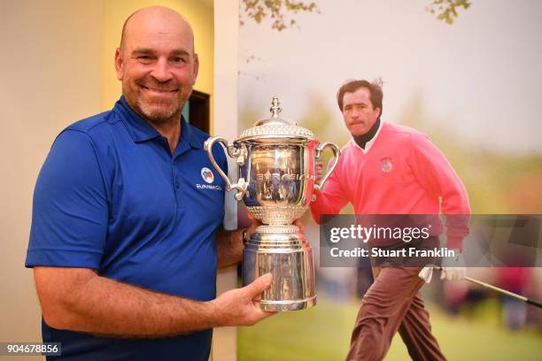 Europe Captain Thomas Bjorn poses with the trophy following his team's victory during the singles matches on day three of the 2018 EurAsia Cup...