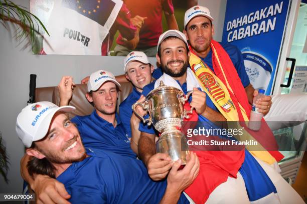 Tommy Fleetwood, Thomas Pieters, Matthew Fitzpatrick, Alexander Levy and Rafa Cabrera-Bello of Europe celebrate with the trophy during the singles...