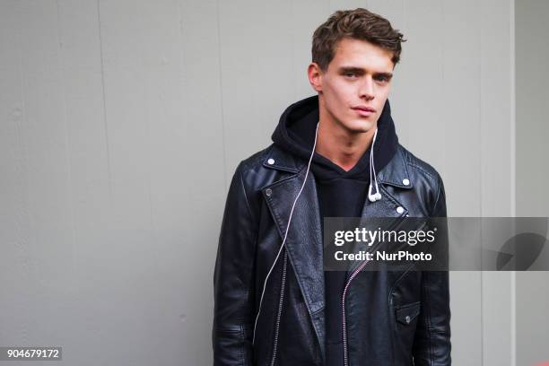 Guest is seen on the set of the Dolce &amp; Gabbana Advertising Campaign street style during Milan Men's Fashion Week Fall/Winter 2018/19 on January...