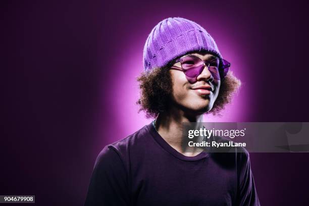 color surge purple portrait of young man - vestuário monocromo imagens e fotografias de stock