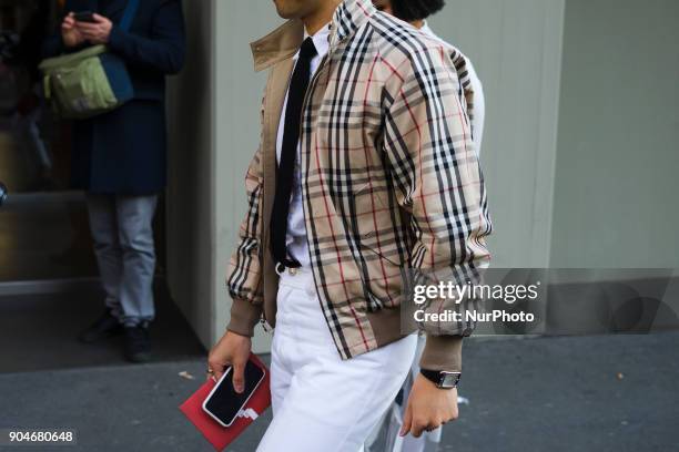 Guest is seen on the set of the Dolce &amp; Gabbana Advertising Campaign street style during Milan Men's Fashion Week Fall/Winter 2018/19 on January...