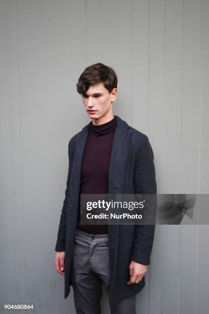Guest is seen on the set of the Dolce &amp; Gabbana Advertising Campaign street style during Milan Men's Fashion Week Fall/Winter 2018/19 on January...