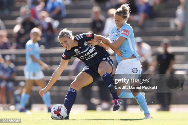Laura Spiranovic of Melbourne Victory and Aivi Luik of Melbourne City contest the ball during the round 11 W-League match between the Melbourne...