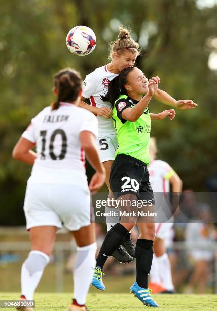 Kahlia Hogg of the Wanderers and Amy Sayer of Canberra contest possession during the round 11 W-League match between Canberra United and the Western...