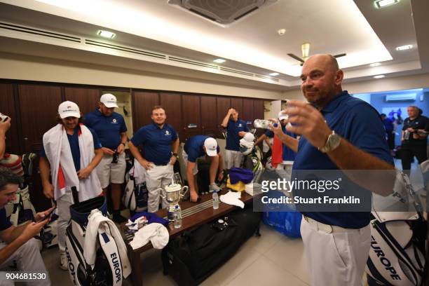 Europe Captain Thomas Bjorn speaks to his players in the locker room following their victory during the singles matches on day three of the 2018...