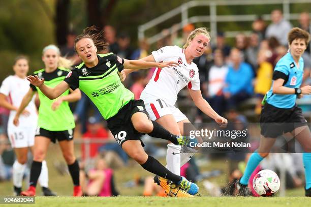 Marlous Pieete of the Wanderers tackles Amy Sayer of Canberra during the round 11 W-League match between Canberra United and the Western Sydney...