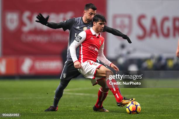 Braga's Portuguese midfielder Joao Carlos Teixeira vies with BBenfica's Greek midfielder Andreas Samaris during the Premier League 2017/18 match...