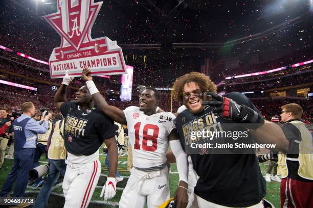 Dylan Moses of the Alabama Crimson Tide and his teammates celebrate after defeating the Georgia Bulldogs during the College Football Playoff National...