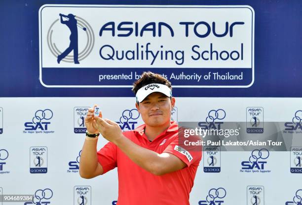 Seungtaek Lee of Korea pictured with the Asian Tour's player's clip securing his 2018 playing rights during round five of the 2018 Asian Tour...