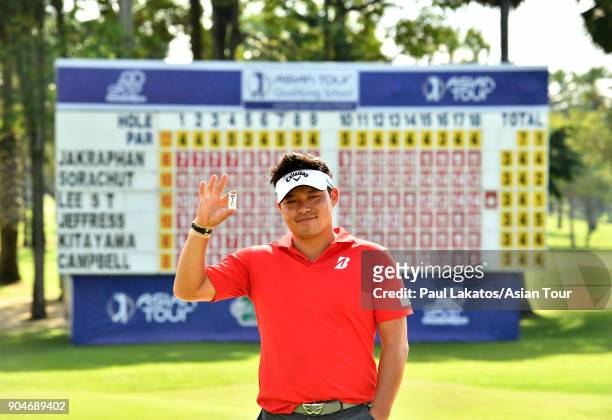 Seungtaek Lee of Korea pictured with the Asian Tour's player's clip securing his 2018 playing rights during round five of the 2018 Asian Tour...