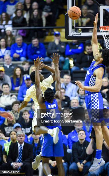 Kentucky Wildcats forward Kevin Knox blocks the shot of Vanderbilt Commodores guard Saben Lee during the first half between the Kentucky Wildcats and...