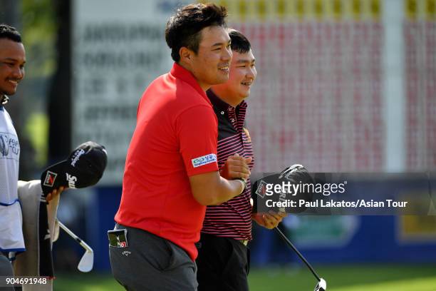 Seungtaek Lee of Korea, left, and Sorachut Hansapiban of Thailand during round five of the 2018 Asian Tour Qualifying School Final Stage at Rayong...