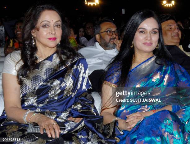 Indian Bollywood actresses Hema Malini and Padmini Kolhapure look on during the 'Umang Mumbai Police Show 2018' in Mumbai on late January 13, 2018. /...