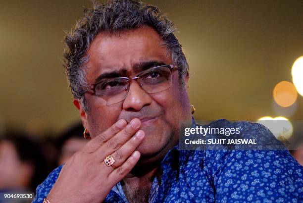 Indian Bollywood playback singer Kunal Ganjawala looks on during the 'Umang Mumbai Police Show 2018' in Mumbai on late January 13, 2018. / AFP PHOTO...