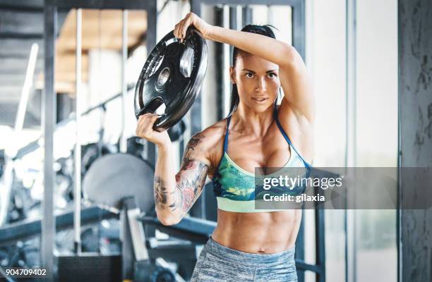 core workout. - images of female bodybuilders stock pictures, royalty-free photos & images