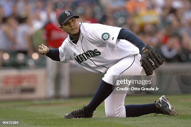 Starting pitcher Felix Hernandez of the Seattle Mariners throws to firstbase against the Los Angeles Angels of Anaheim on September 2, 2009 at Safeco...