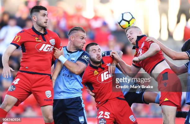 Jordan Elsey of Adelaide United gets a head to a free kick at goal during the round 16 A-League match between Adelaide United and Sydney FC at...