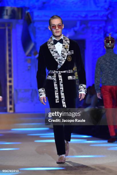 Model walks the runway at the Dolce & Gabbana show during Milan Men's Fashion Week Fall/Winter 2018/19 on January 13, 2018 in Milan, Italy.