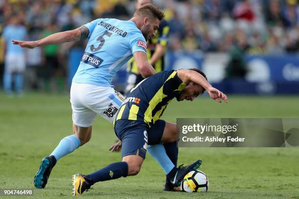 Asdrubal of the Mariners is contested by Ben Schenkeveld of Melbourne City during the round 16 A-League match between the Central Coast Mariners and...