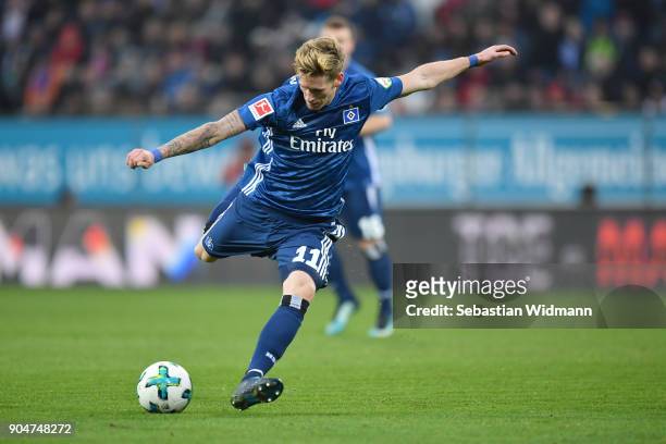 Andre Hahn of Hamburg takes a shot at the goal during the Bundesliga match between FC Augsburg and Hamburger SV at WWK-Arena on January 13, 2018 in...