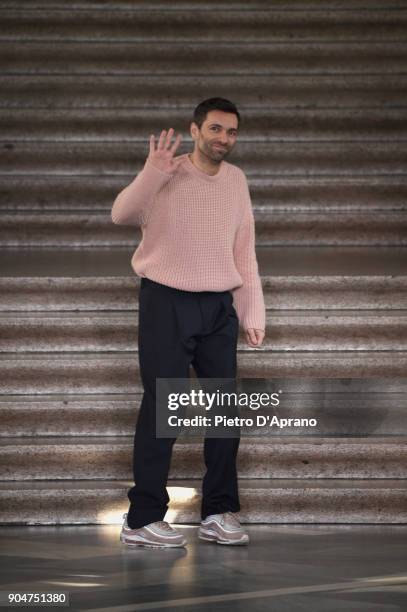 Designer Massimo Giorgetti acknowledges the applause of the audience at the MSGM show during Milan Men's Fashion Week Fall/Winter 2018/19 on January...