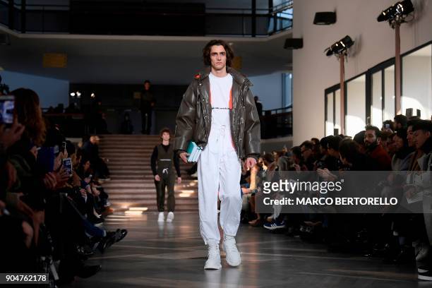 Model presents a creation for fashion house MSGM during the Men's and Women's Fall/Winter 2019 fashion show in Milan, on January 14, 2018. / AFP...