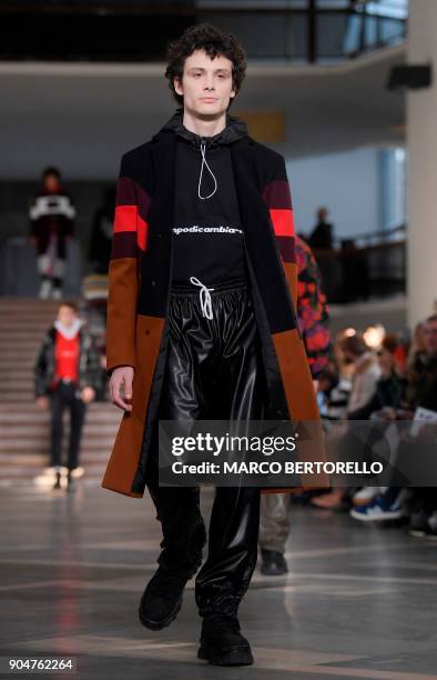 Model presents a creation for fashion house MSGM during the Men's and Women's Fall/Winter 2019 fashion show in Milan, on January 14, 2018. / AFP...